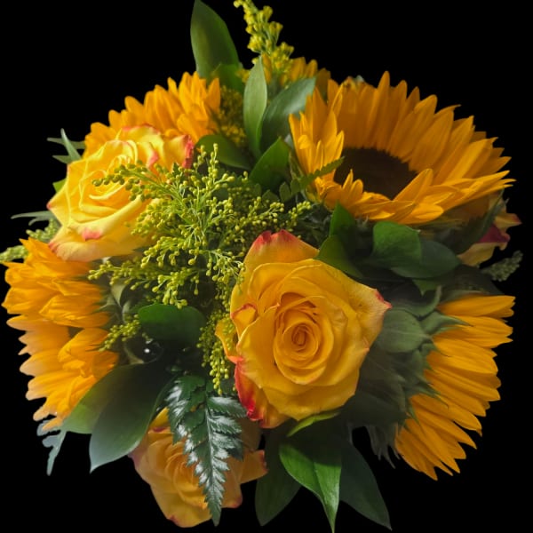 Yellow roses and sunflowers in a compact bouquet