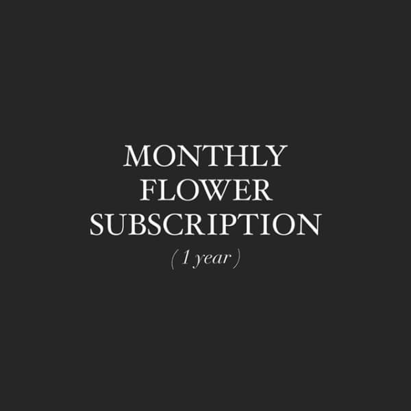Graphic with white text reading 'Monthly Flower Subscription (1 year)' on a dark background