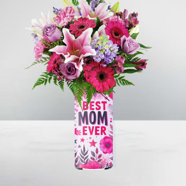 Tall pink and purple bouquet with lilies, roses, and gerbera daisies in a Best Mom Ever vase