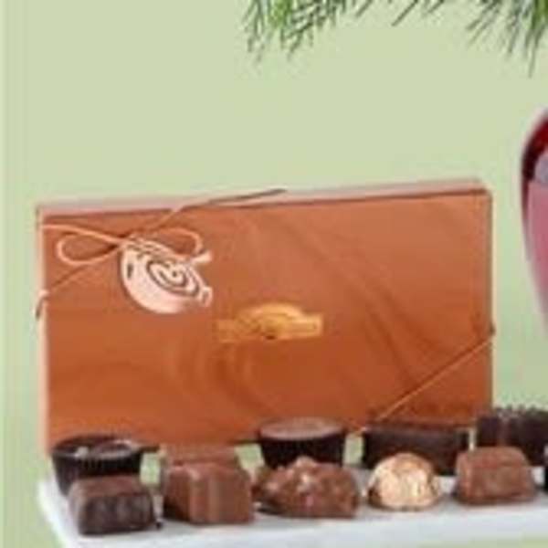 Box of assorted chocolates with a ribbon tie
