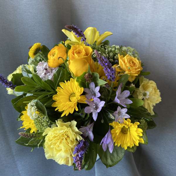 Yellow and lavender mixed bouquet with roses and daisies