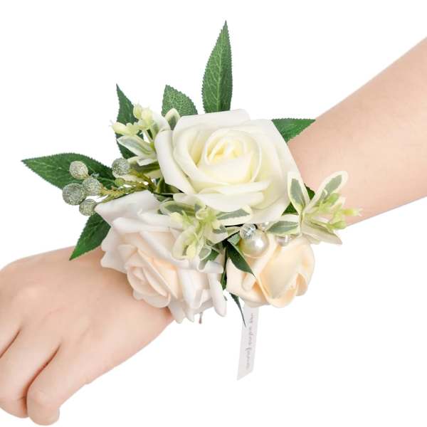 White rose wrist corsage with small accent flowers