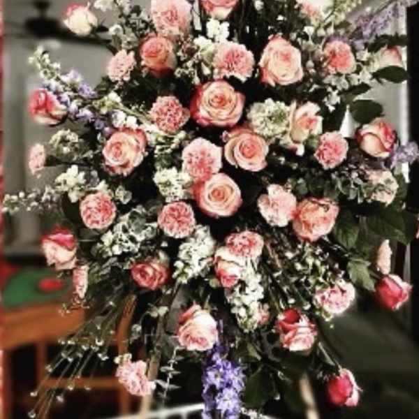 Tall floral spray with pink roses and purple flowers