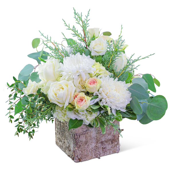 White roses and chrysanthemums in a rustic square container