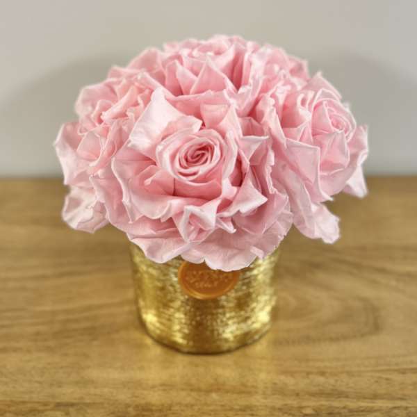 Pink rose bouquet in a gold textured container
