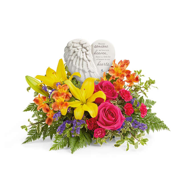 Bright mixed flower arrangement with angel wings memorial plaque