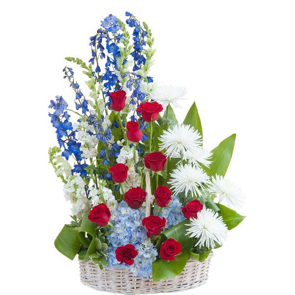 Tall red, white, and blue basket arrangement with red roses, white mums, and blue delphinium.