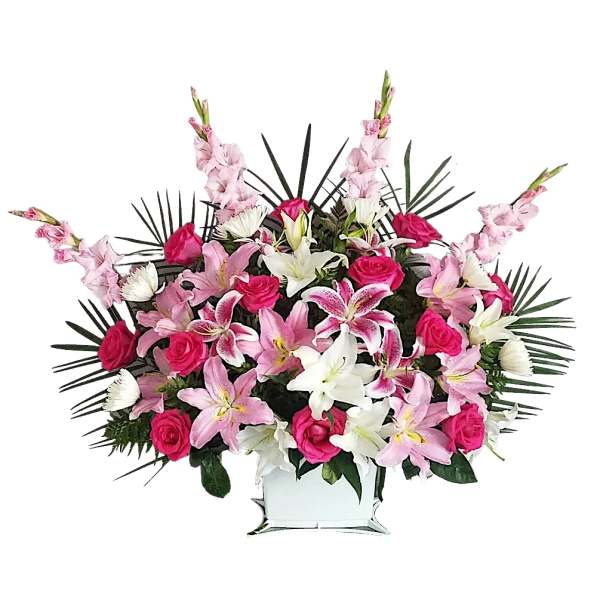 Pink and white floral arrangement in a white vase
