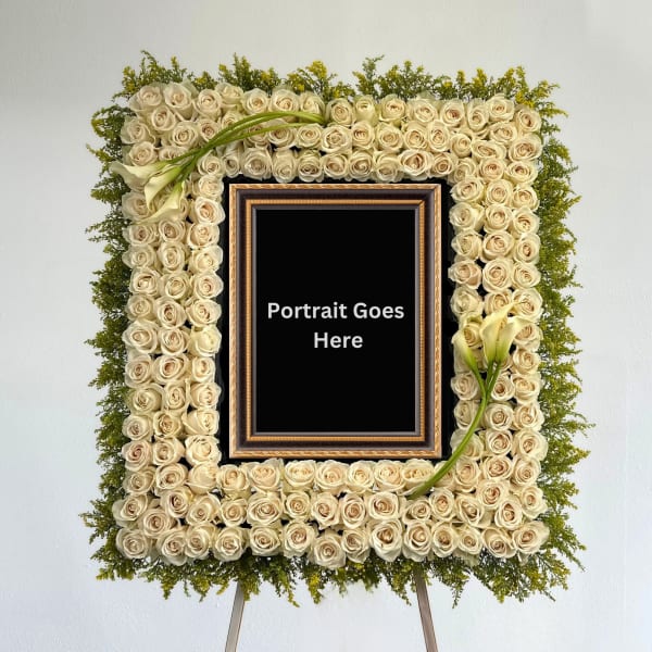 Square floral frame of cream roses with calla lilies around a portrait opening