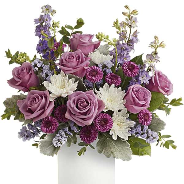 Pink roses and white daisies in a white vase