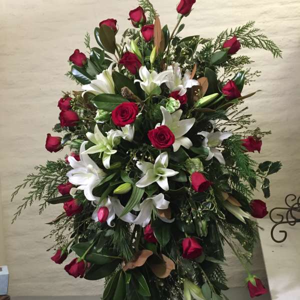 Standing floral spray with red roses and white lilies