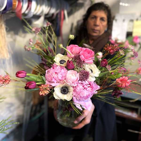 Pink and white mixed bouquet in a glass vase