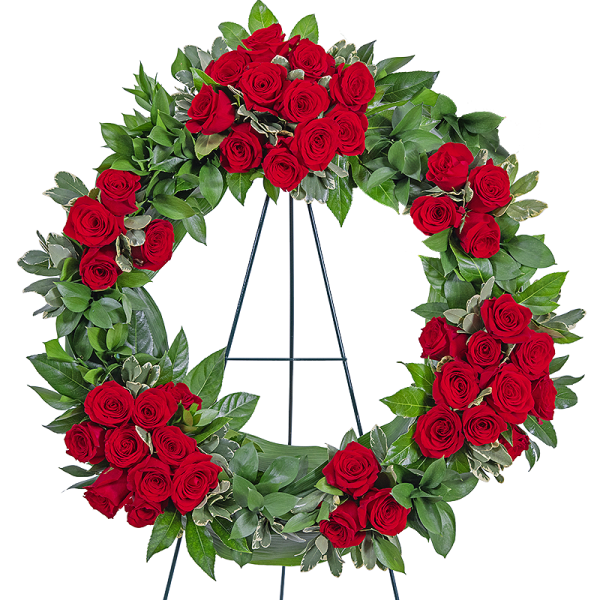Red rose wreath on a metal easel