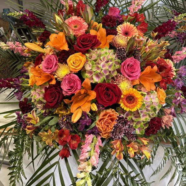 Large tropical bouquet with roses, lilies, gerberas, and snapdragons