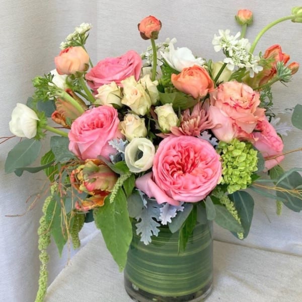 Pink and peach mixed bouquet in a glass vase