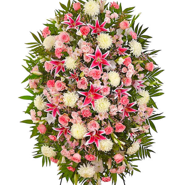 Large standing spray of pink and white flowers with green foliage