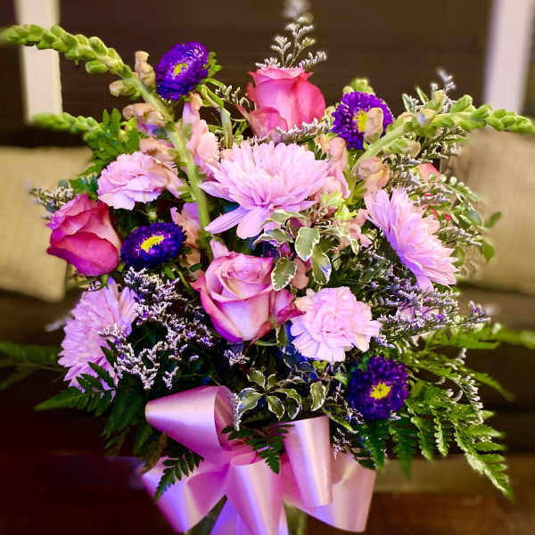 Pink and purple mixed bouquet with a satin ribbon