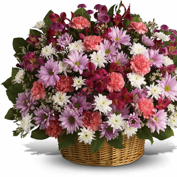 Basket of pink, purple, and white mixed flowers