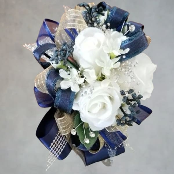 White rose bouquet with navy and gold ribbon accents
