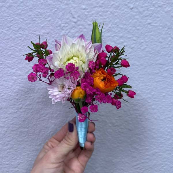 Small hand-tied bouquet with pink, white, and orange flowers