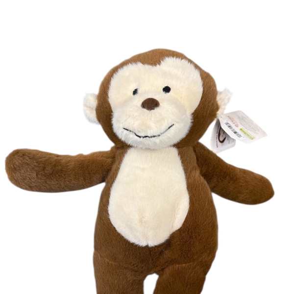 Brown and white plush monkey toy with outstretched arms