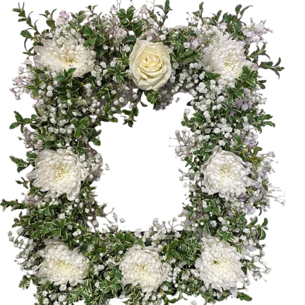 White floral wreath with roses and chrysanthemums