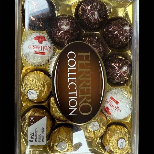Assorted Ferrero Rocher chocolates in a clear gift box