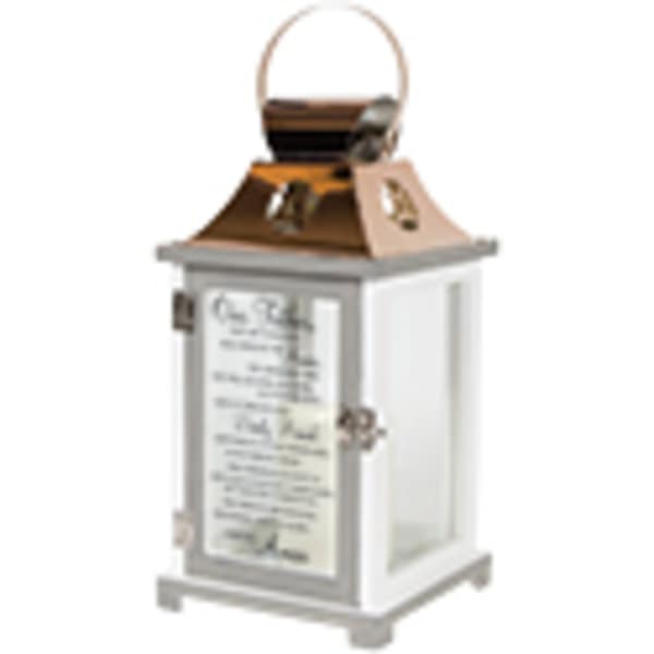 White decorative lantern with a copper top and handle