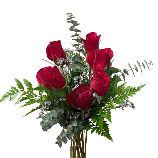 Bouquet of red roses in a clear glass vase