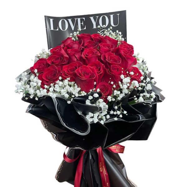 Bouquet of red roses with white baby's breath and a LOVE YOU sign