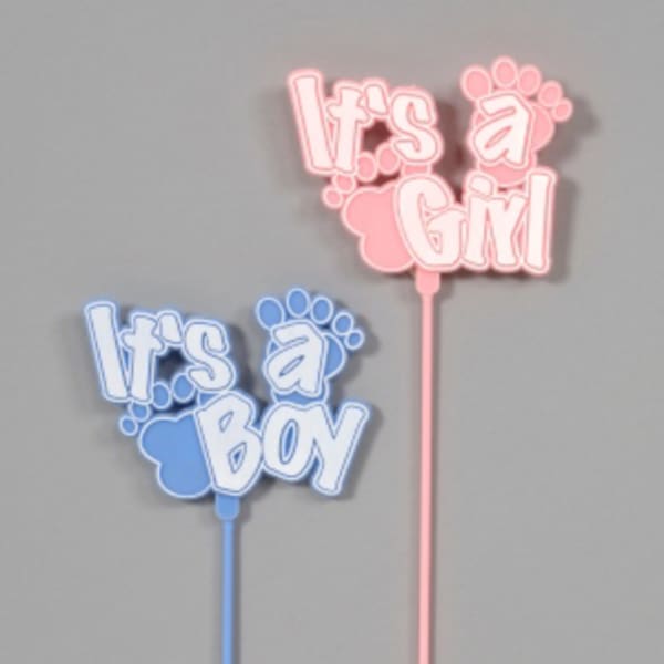 Pink and blue baby shower toppers reading "It's a Girl" and "It's a Boy"