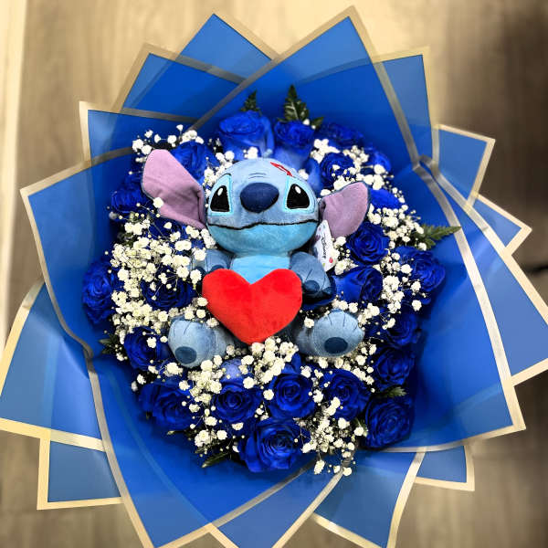Blue rose bouquet with a Stitch plush toy and red heart