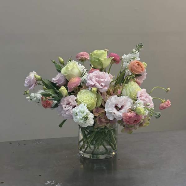 Pastel mixed bouquet in a clear glass vase
