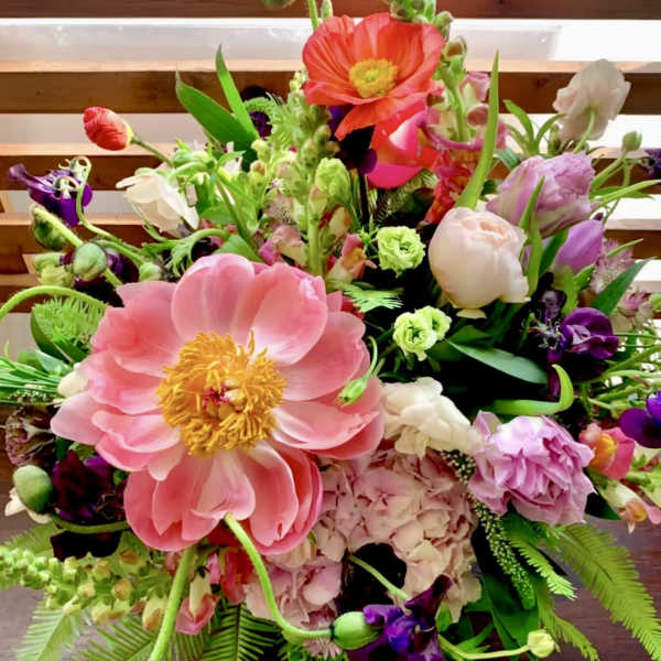 Colorful mixed bouquet with large pink blooms and purple flowers