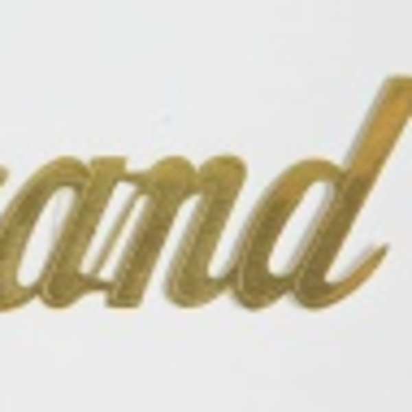 Gold script word "Grand" on a white background