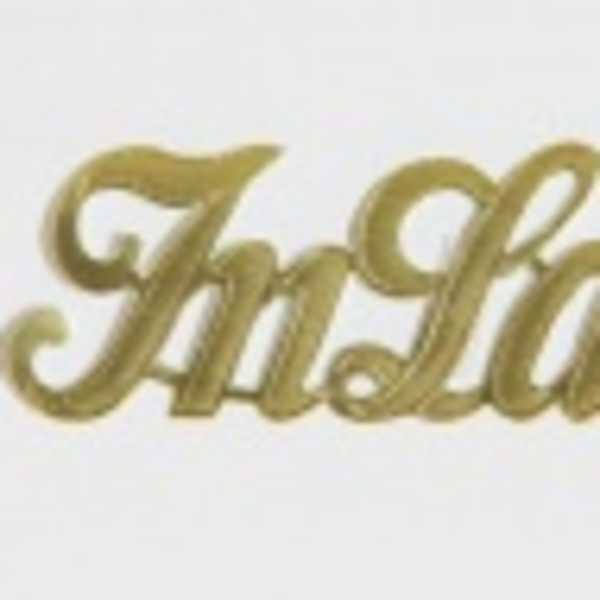 Gold script text reading "In Love" on a white background