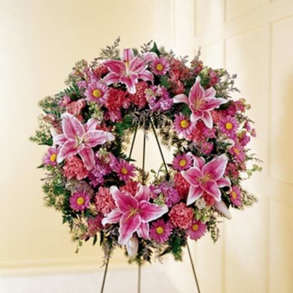 Pink floral wreath on a standing easel
