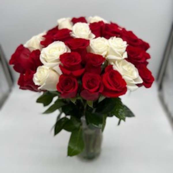 3 dozen roses in a vase