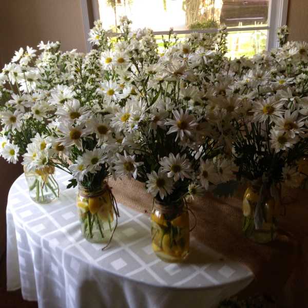 Mason jars with arrangements