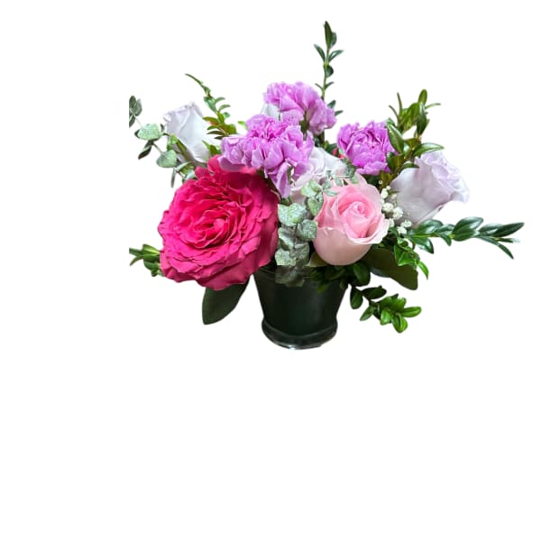 Pink and lavender roses arranged in a dark vase