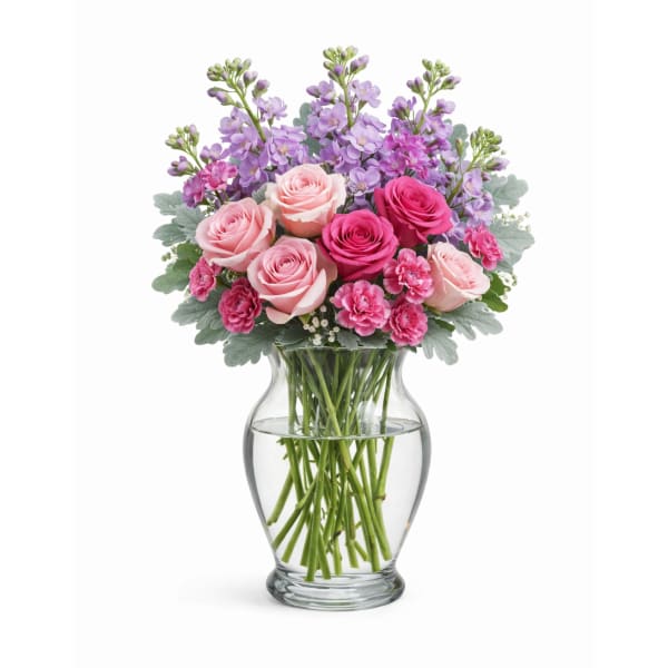 Pink and lavender bouquet in a clear glass vase