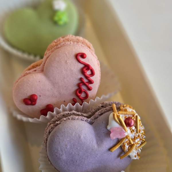 Heart-shaped macarons in a gift box