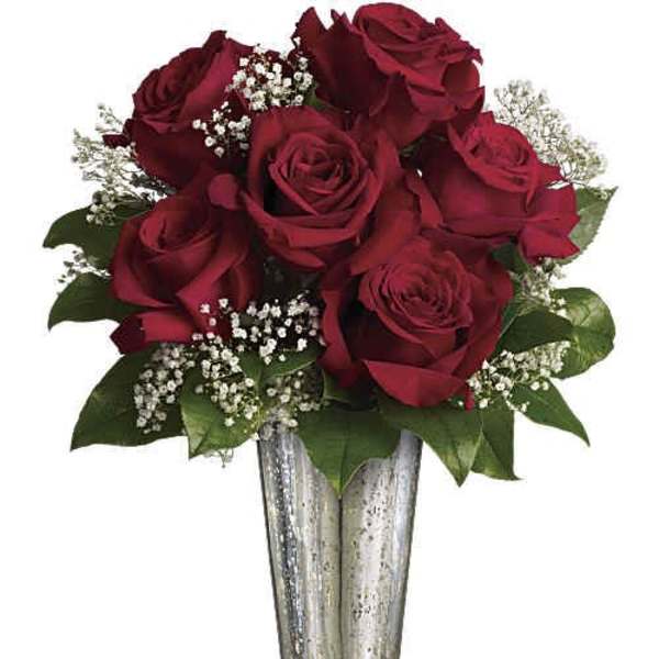 Red roses arranged in a silver vase with baby's breath