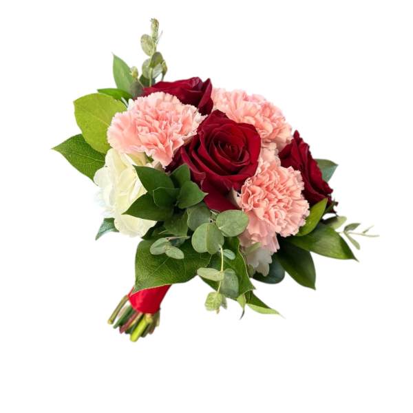 Bouquet of red roses and pink carnations with greenery