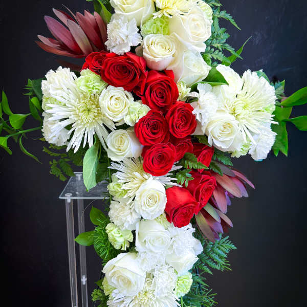 Standing floral spray with red and white roses and white chrysanthemums