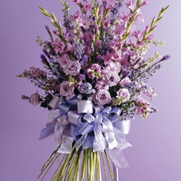 Tall lavender bouquet with roses and ribbon bows