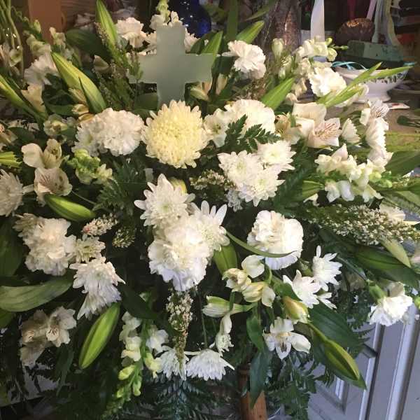 Large white floral spray with lilies and chrysanthemums