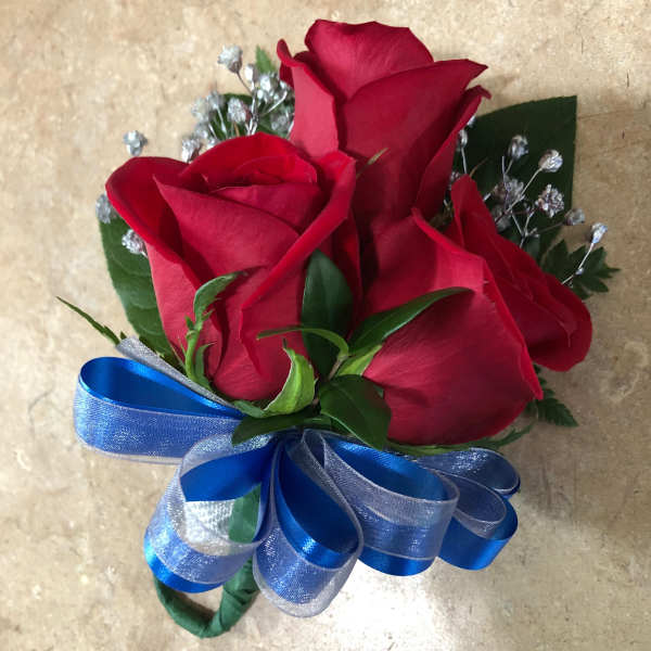 Bouquet of red roses with a blue ribbon bow