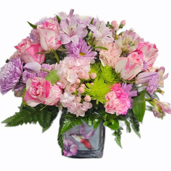 Pink and lavender mixed bouquet in a glass vase