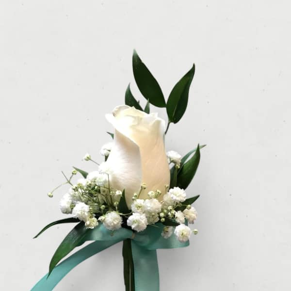 White rose boutonniere with baby's breath and teal ribbon